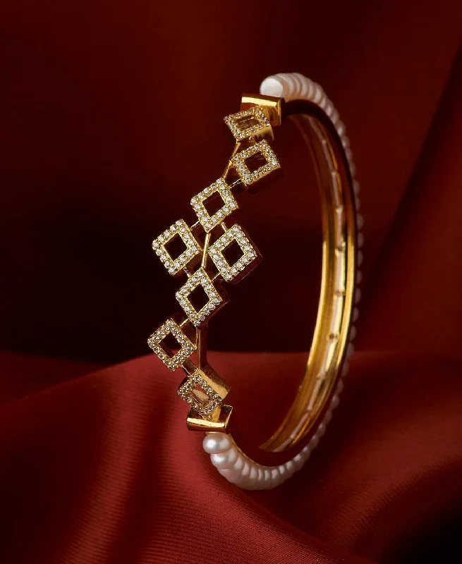 Regal Stone Studded Pearl Bangle