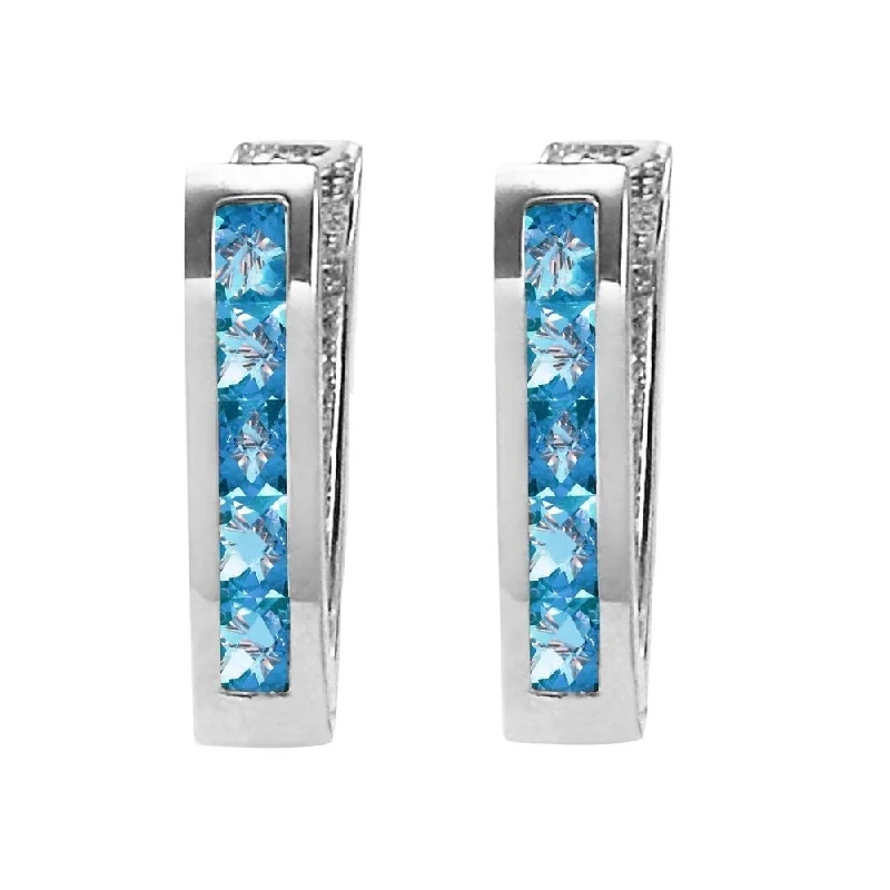 1.2 CTW 14K Solid White Gold Oval Huggie Earrings Blue Topaz